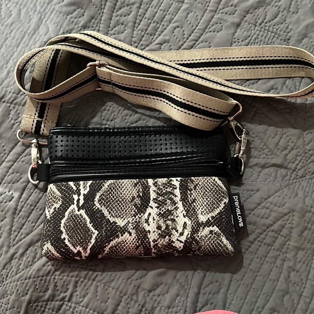 Prenelove animal print belt bag.